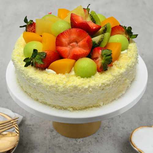 Mixed Fruit Cake with Topping of Fruits